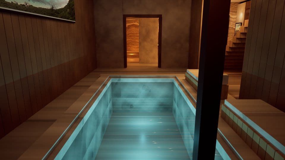 The indoor pool lit from beneath the water
