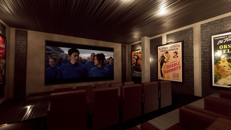 The home theatre, screen lit in front of the seats